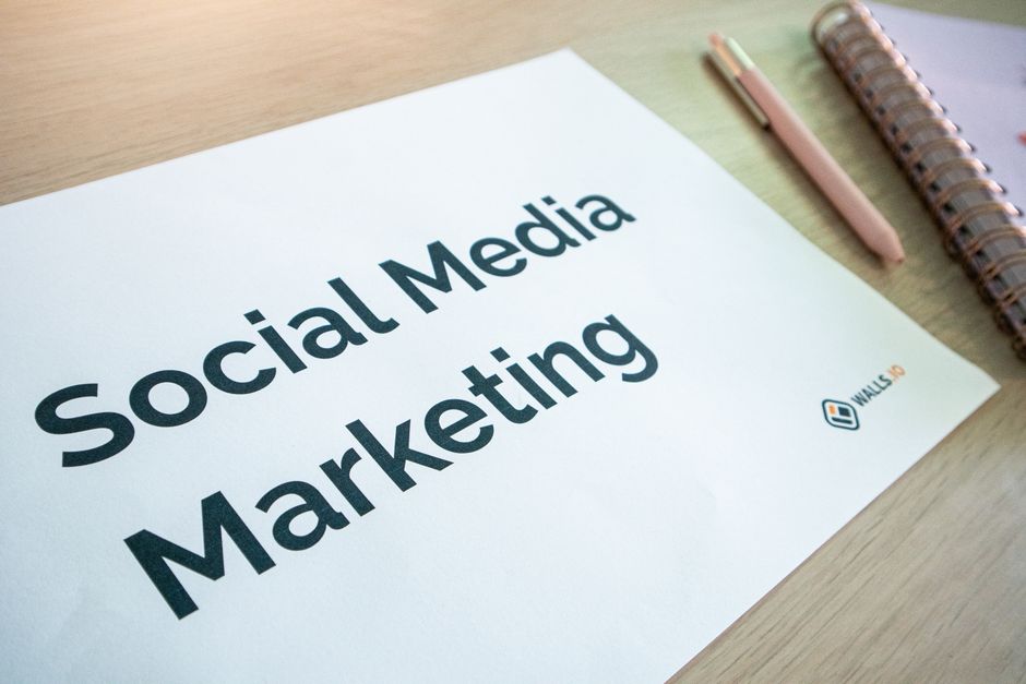 Close-up of a social media marketing document on a desk with a pen and notebook. — TikTok Shop's growth in Germany